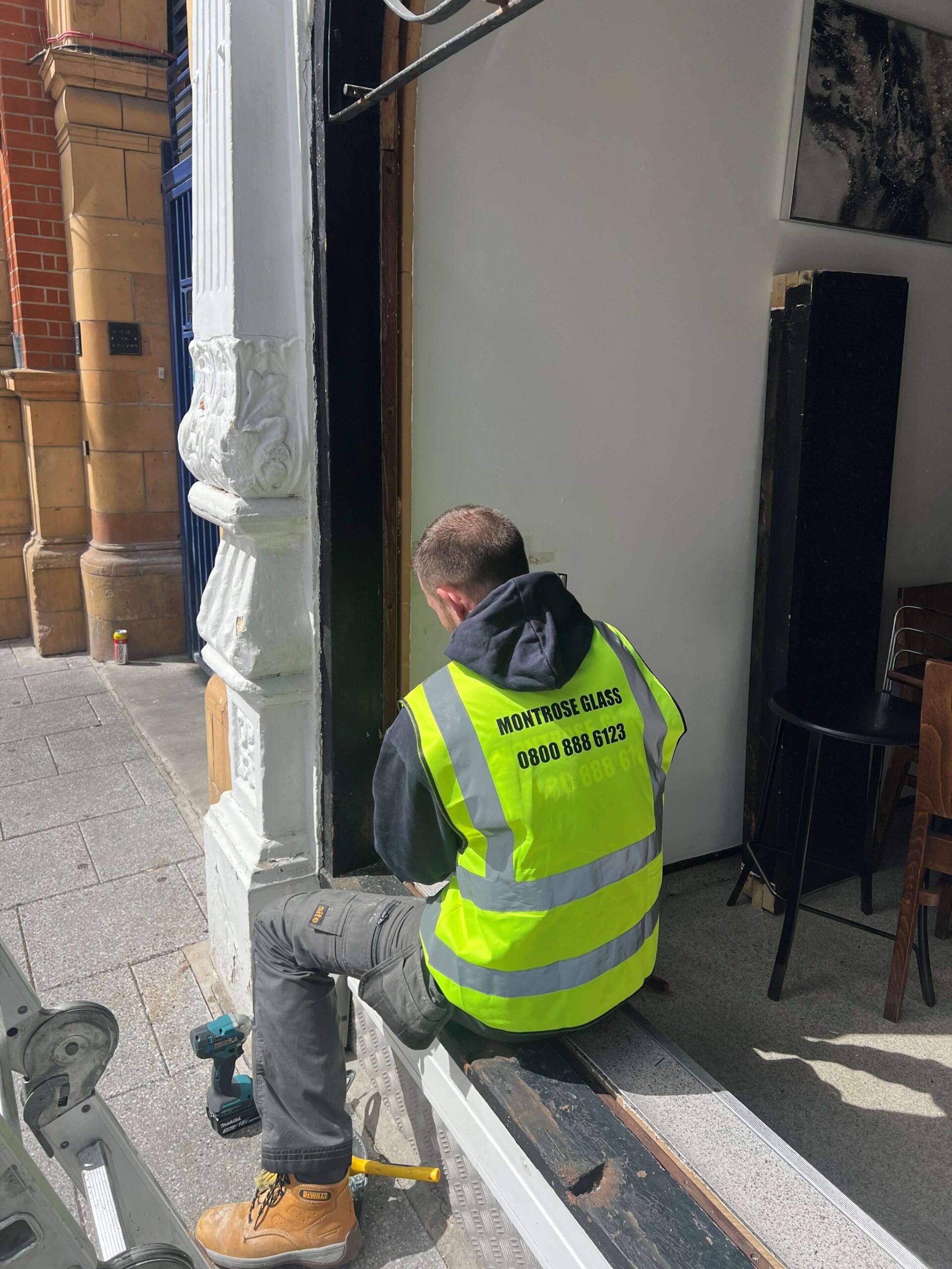 man installing glazing