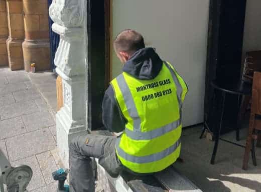 man installing glazing